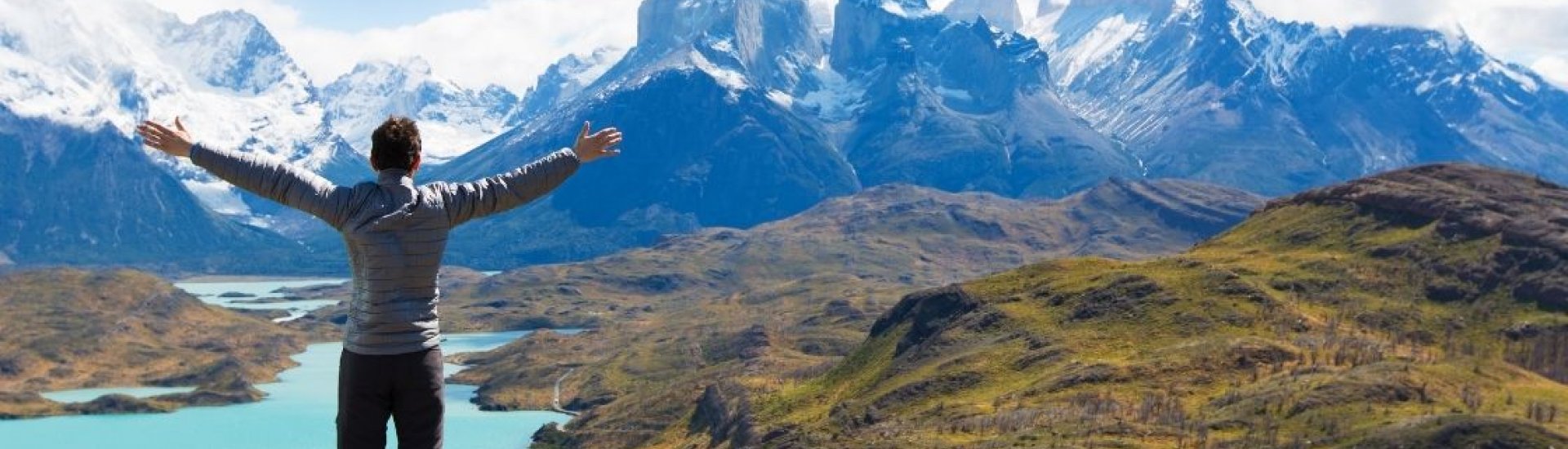 a person enjoying the view overlooking patagonia mountains